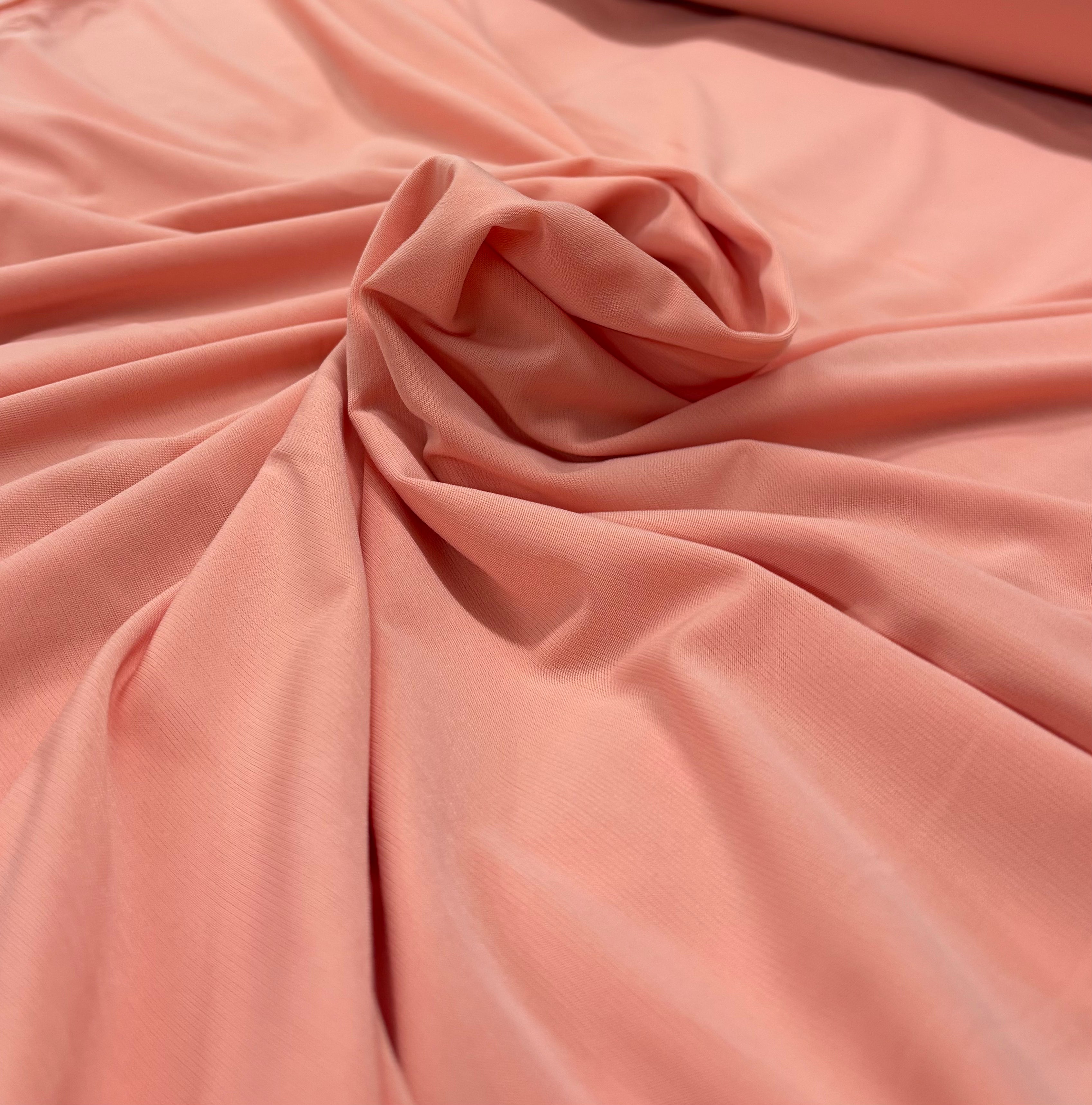 Tessuto MAGLINA “rosa pesca”