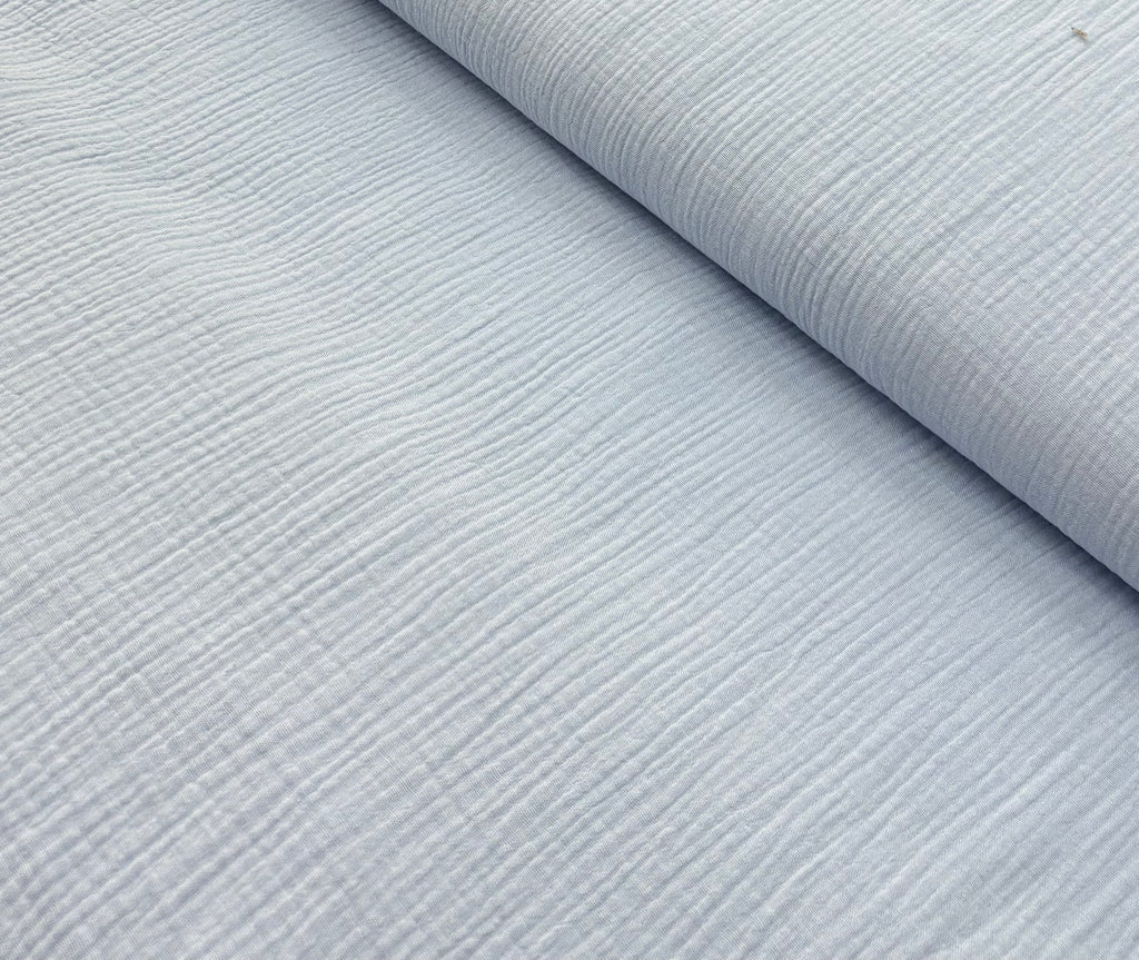 Tessuto MUSSOLA IN COTONE “celeste”