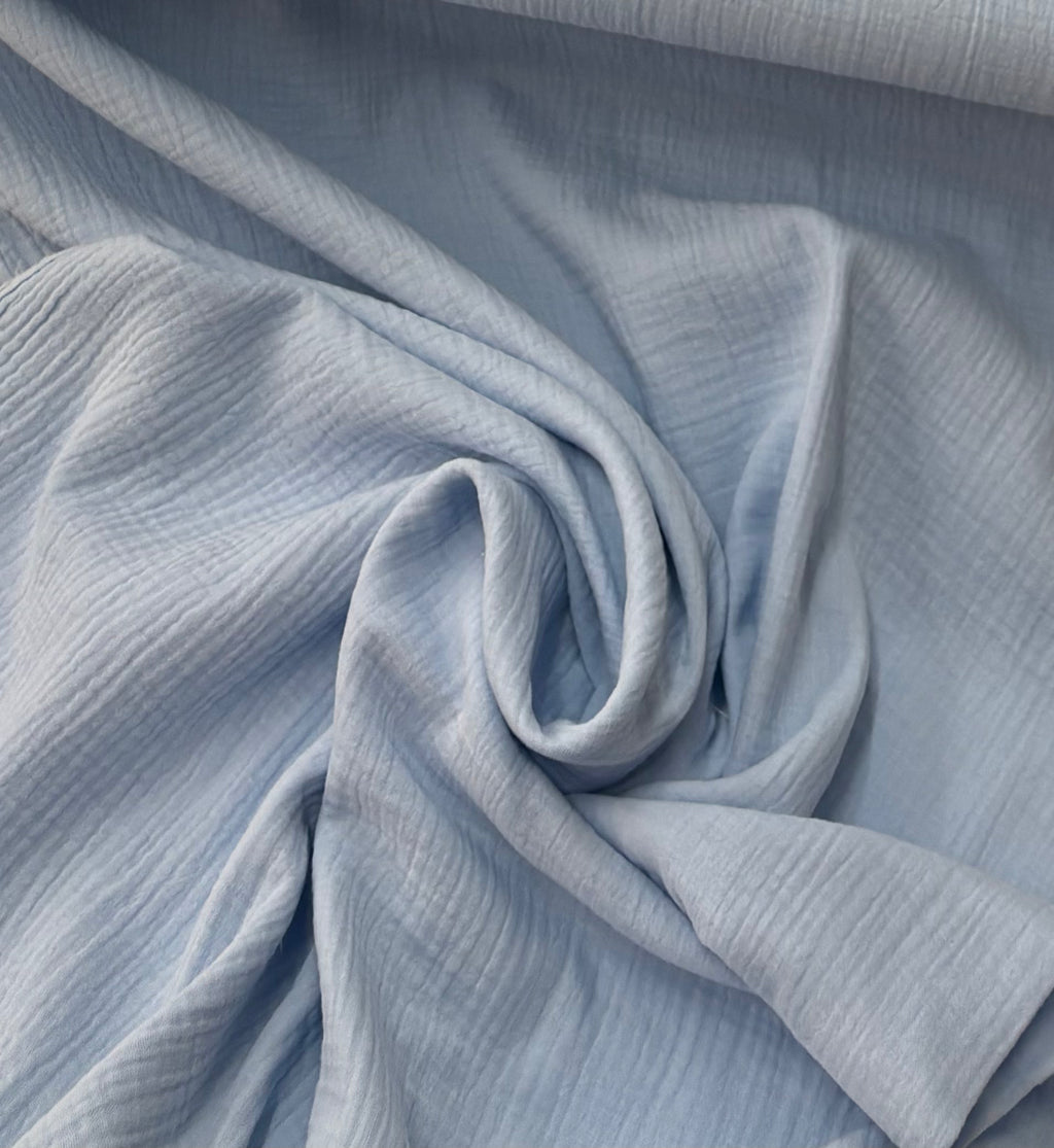 Tessuto MUSSOLA IN COTONE “celeste”