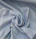 Tessuto MUSSOLA IN COTONE “celeste”